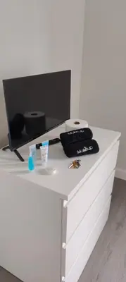 a white desk with a computer on top of it at Spacious 3BR-2BA Apt near Downtown-Miami Airport in Miami