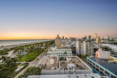 an aerial view of a city and the beach at Crown Jewel of Ocean Drive- 2 story Penthouse, 4 Bedrooms & Private rooftop spa in Miami Beach