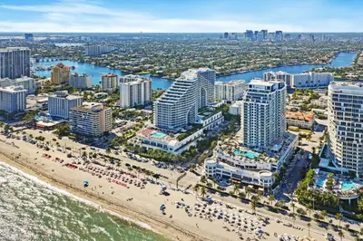 an aerial view of a beach and buildings at The W 1906 in Fort Lauderdale