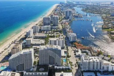 an aerial view of a beach and buildings at The W 1906 in Fort Lauderdale