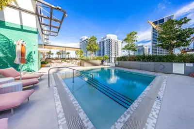 a swimming pool on the roof of a building at 2BR Corner Suite MIA Wrap Balcony Rooftop Pool in Miami