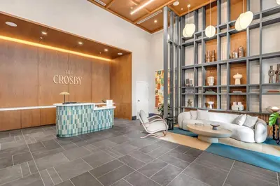 a store lobby with a couch and a table at 2BR Corner Suite MIA Wrap Balcony Rooftop Pool in Miami