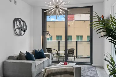 a living room with a couch and a table at The Downtown Miami 2BR 2BA Luxury Stay in Miami