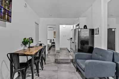 a kitchen and dining room with a table and chairs at Cozy Studio 2 Blocks from the Beach - Unit #3 in Hollywood