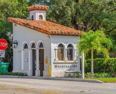 a small building on the side of a street at Spanish Style home in Miami Upper East Side in Miami