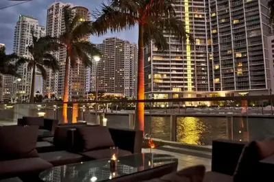 a view of a city skyline with palm trees at Prime Brickell Stay with Pool Gym & Parking in Miami