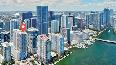an aerial view of a city with a red marker at Prime Brickell Stay with Pool Gym & Parking in Miami