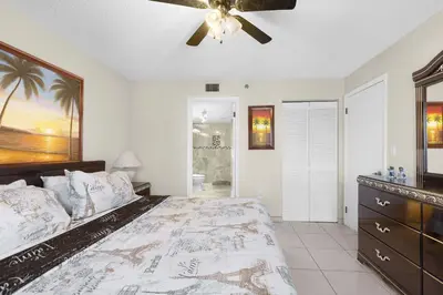 a bedroom with a bed and a ceiling fan at Le Frontenac 413 STR-03005 in Sunny Isles Beach