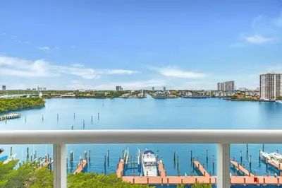 a view of a river with boats docked at Le Golden Bay 902 STR-00876 in Sunny Isles Beach