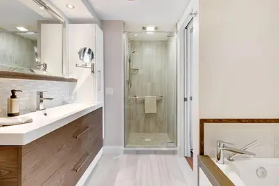 a bathroom with a shower and a sink at Le Marina Bay 505 STR-02744 in Sunny Isles Beach