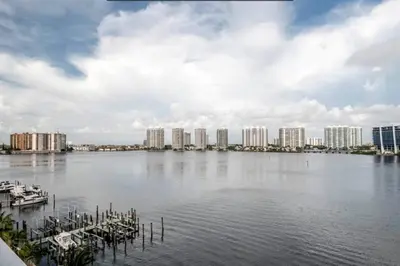 a view of a large body of water with buildings at Le Marina Bay 801 STR-01477 in Sunny Isles Beach