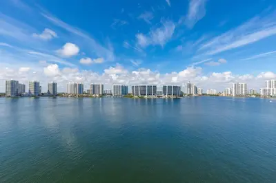 a large body of water with a city in the background at Le Marina Bay 801 STR-01477 in Sunny Isles Beach