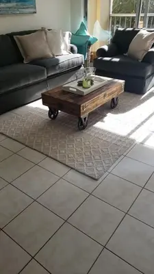 a living room with a coffee table and a couch at Le Marbella 303 STR-02828 in Sunny Isles Beach