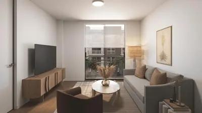 a living room with a couch and a tv at New Luxury Hotel in Edgewater • 2 Suites • Rooftop Pool Sense28 by AvantStay in Miami
