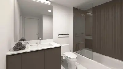a bathroom with a sink and a toilet and a tub at New Luxury Hotel in Edgewater • 2 Suites • Rooftop Pool Sense28 by AvantStay in Miami