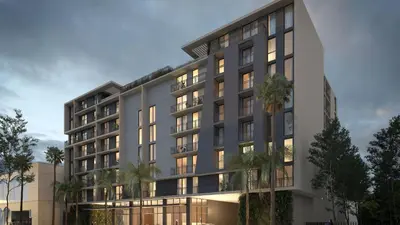 a rendering of a building with palm trees in front at New Luxury Hotel in Edgewater • 2 Suites • Rooftop Pool Sense28 by AvantStay in Miami