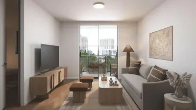 a living room with a couch and a tv at New Luxury Hotel in Edgewater • 2 Suites • Rooftop Pool Sense28 by AvantStay in Miami
