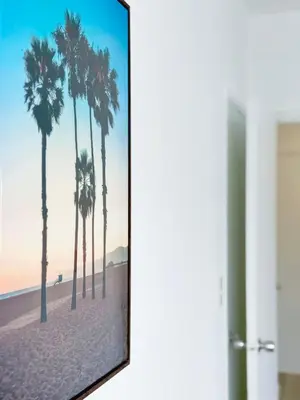 a picture of palm trees on the beach at 1BR Miami Beach Apt with King plus 2 Queens & Workspace in Miami Beach