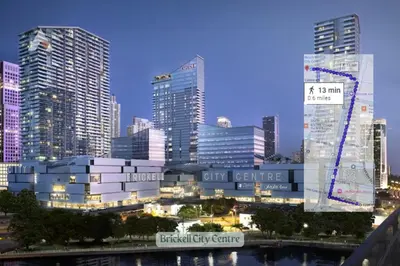 a group of tall buildings in a city at night at Sky-High Luxury 3BR with Stunning Brickell City & Bay Views in Miami