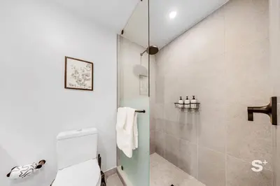 a bathroom with a toilet and a shower at Downtown Miami - Luxury Condo with City Views in Miami