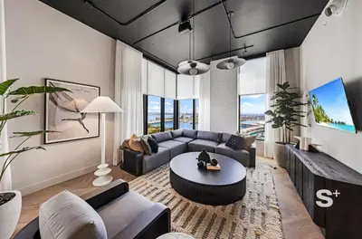 a living room with a couch and a table at Downtown Miami - Luxury Condo with City Views in Miami
