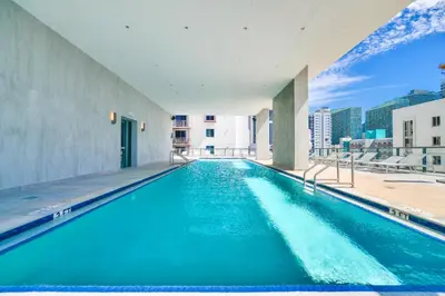 a swimming pool on the roof of a building at Modern Escape in Brickell w Pool & Gym in Miami