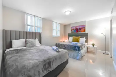 a bedroom with two beds in a room at Bright Escape Near Hot Spots in Miami