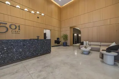 a lobby with a couch and two toilets in a building at New Luxury Studio Downtown Miami Prime Location in Miami