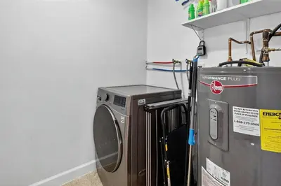 a washer and dryer in a room at Spacious 3BR Home with Private Pool in Hollywood in Hollywood