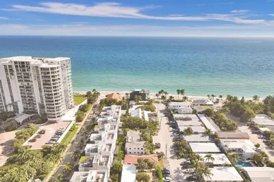 an aerial view of a resort near the ocean at Walnut Beach - By Atlantikos in Hollywood