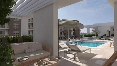 a patio with a couch and a swimming pool at Sleeps 20 3 Suites in New Luxury Hotel w Rooftop Pool Sense28 by AvantStay in Miami