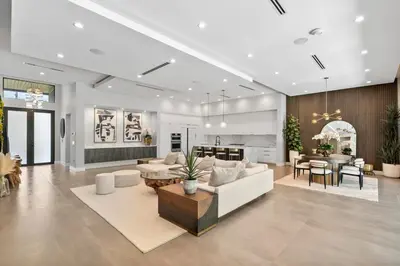 a living room with a white couch and a table at New construction Fort Lauderdale luxury villa with Pool in Fort Lauderdale