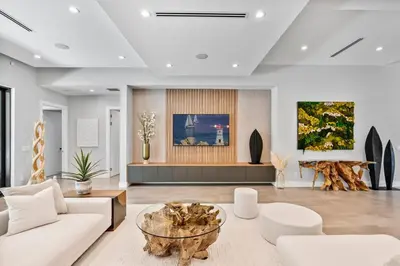 a living room with a white couch and a table at New construction Fort Lauderdale luxury villa with Pool in Fort Lauderdale