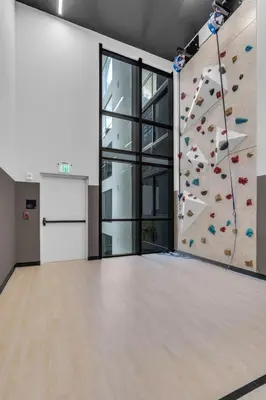 a large room with a climbing wall in a building at Free Parking Downtown Condo Resort Amenities in Miami