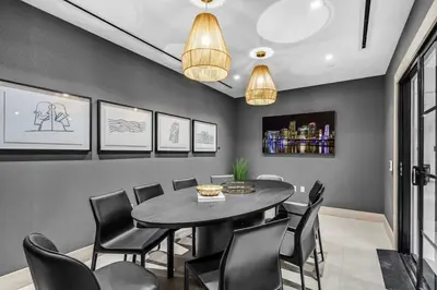 a dining room with a table and chairs at Free Parking Downtown Condo with Resort Amenities in Miami