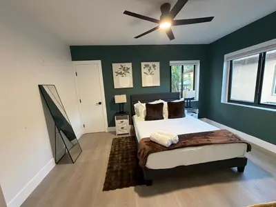 a bedroom with a bed and a ceiling fan at 76 Tropical Retreat in Miami in Miami