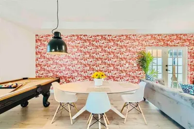 a dining room with a ping pong table and a pool table at 397 A - Beautiful Home in Miami in Miami