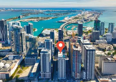 an aerial view of a city with a red marker at Modern MIA Worldcenter Studio with Balcony Pool & Gym in Miami
