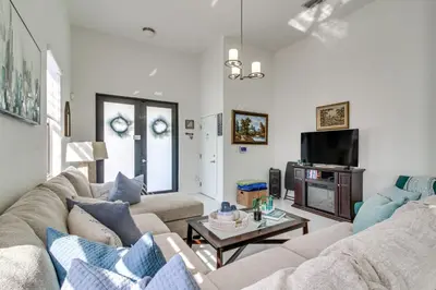 a living room with two couches and a tv at Easy Park and University Access! Family Miami Escape in Miami