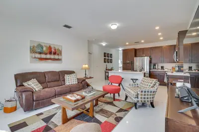 a living room with a couch and a table at Easy Park and University Access! Family Miami Escape in Miami