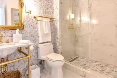 a bathroom with a toilet and a shower and a sink at Downtown Apartment with free parking near Brickell in Miami