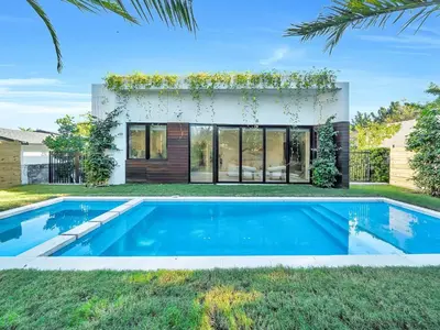 a swimming pool in the backyard of a house at Luxury Pool Home - Downtown Brickell in Miami