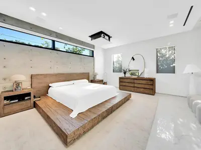 a bedroom with a large bed and a large window at Luxury Pool Home - Downtown Brickell in Miami