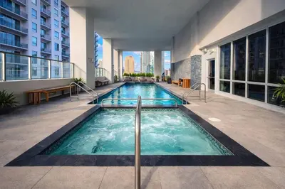 a swimming pool in the middle of a building at Miami Bay Million-Dollar View | Private Condo in Miami