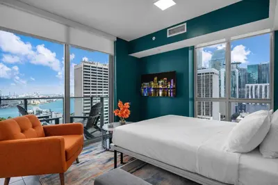 a bedroom with a large bed and a large window at Miami Bay Million-Dollar View | Private Condo in Miami