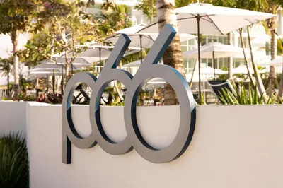 a sign for a restaurant on a wall at Pier Sixty-Six in Fort Lauderdale