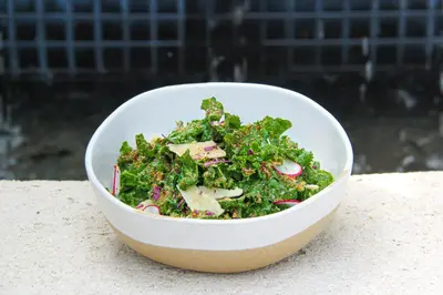 a salad in a white bowl on a table at Miccosukee Casino & Resort in Miami