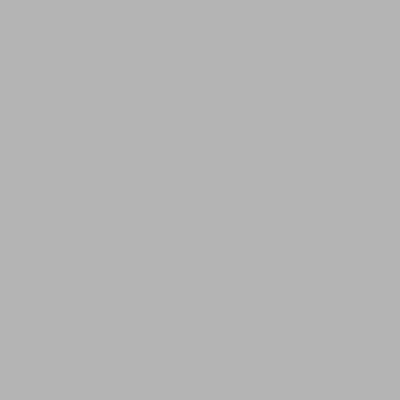 a hotel room with a bed and a desk and a window at Radisson Resort Miami Beach in Miami Beach