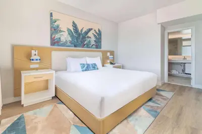 a bedroom with a large bed in a room at Radisson Resort Miami Beach in Miami Beach