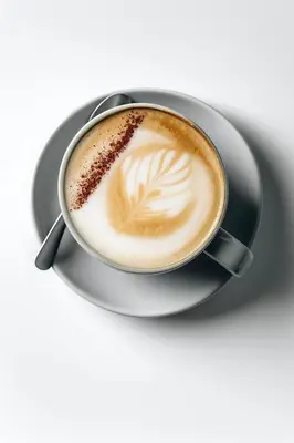 a cup of coffee sitting on a plate at Nassau Suite South Beach, an All Suite Hotel in Miami Beach